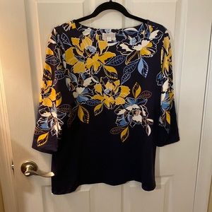 Charter Club Women’s 1x knit top. Floral-blue, yellow and white on black.